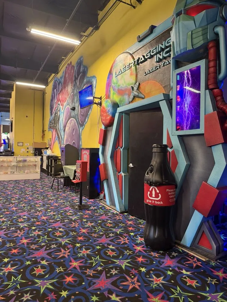 SacTag arena entrance with sci-fi themed decor and arcade carpet