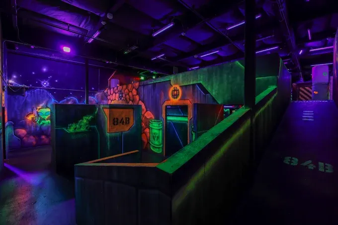 Urban futuristic style neon-lit laser tag arena at SacTag in Sacramento, California.