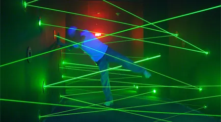 Laser maze challenge with neon beams at SacTag.